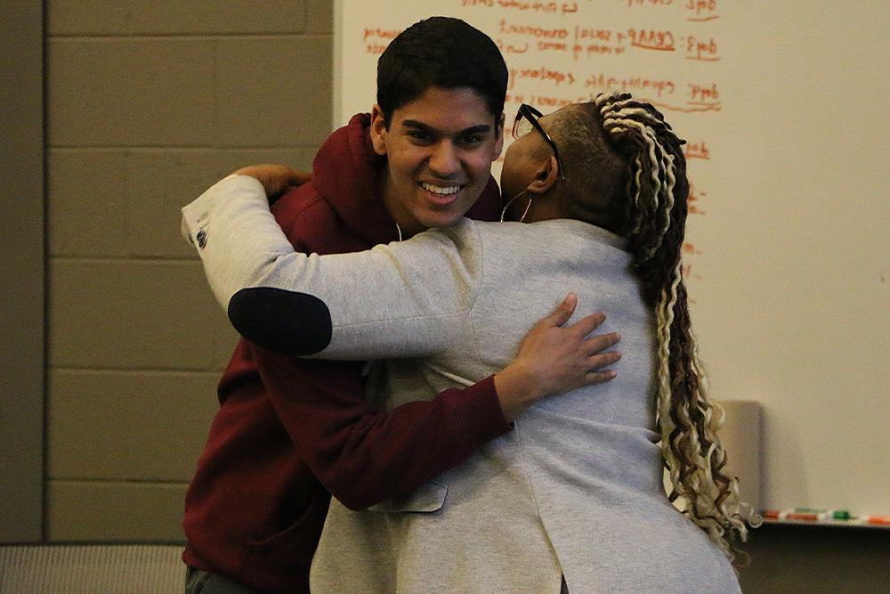 An image of a student celebrating completion of OSEP